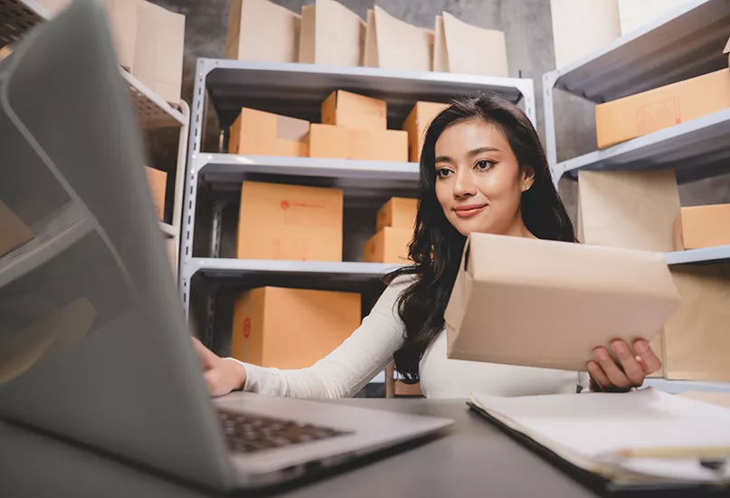 Business owner prepares parcel